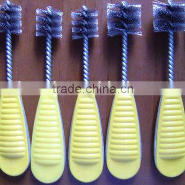 Plumbing fitting brushes in stainless steel wire