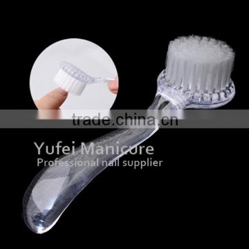 facial brush is used to clean off the left dust of polished nail