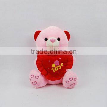 Stuffed pink bear with heart toys