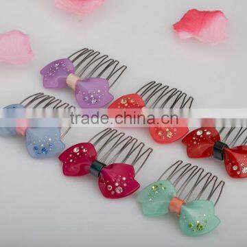 Wholesale plastic butterfly hair accessories rhinestone solid color hair comb