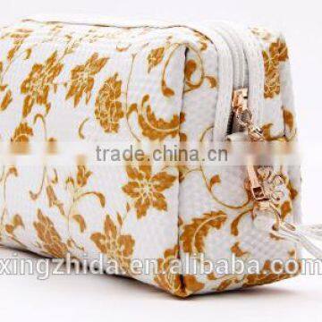 Blue and White Diamond Pattern Cosmetic Bag in Hand photo-3
