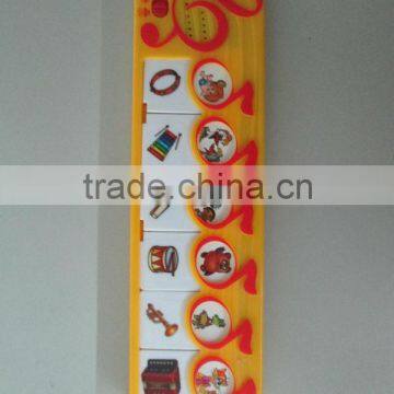 Talking button music toy