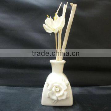 white ceramic oil diffuser with rose