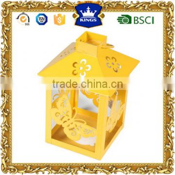 Mini yellow metal candle lantern with butterfly and flowers design