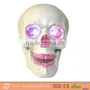 Halloween natural plastic skull with LED with glittered eyes, nose and mouth, with color led eyes. button batteries included.