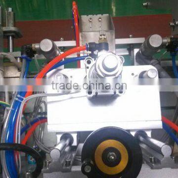 China Guangzhou GMP Standard Double Head Face Mask Making Machine photo-4