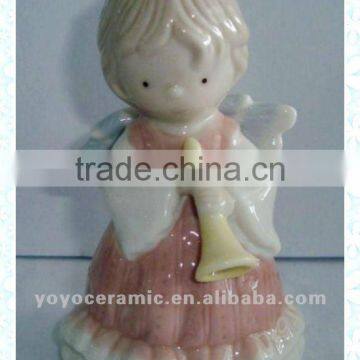 ceramic angel with horn ornament