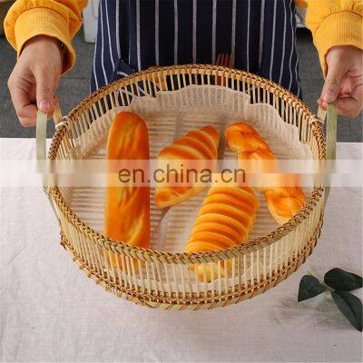 Hand woven storage basket round bamboo basket with handle straw platter tray wholesale