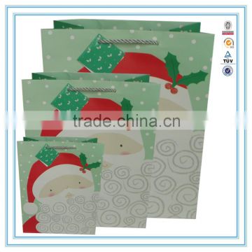 China supplier custom glitter luxury Christmas paper bag Santa Claus bag