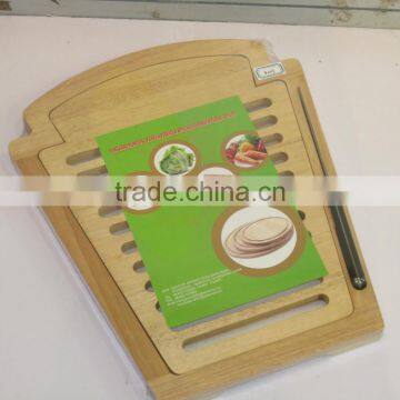 wooden bread board with knife