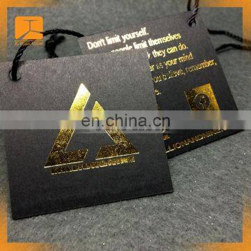 Hot sale custom black card paper hang tag/gold foil center folded swing tag