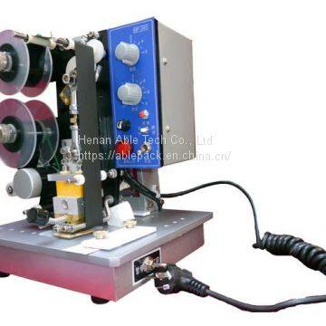 HP241B hot stamping coding machine  to print the batch number on paper , plastic