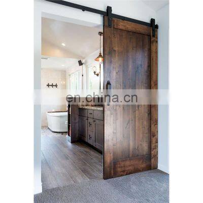 Bathroom sliding barn door with rails