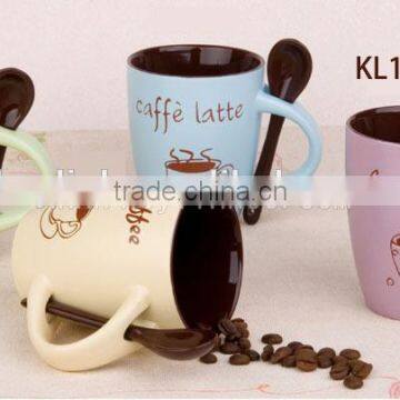 Two color stoneware cafe mug wtih spoon