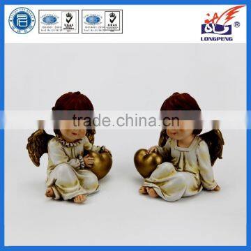 European Sitting Poly Angel With Heart Statue for Home Decor