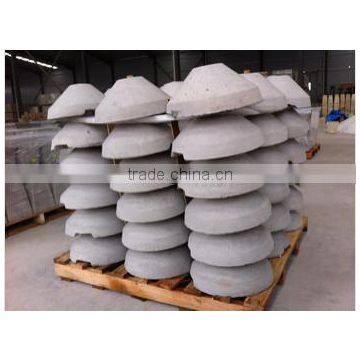 Cement block base stone for clothesline pole