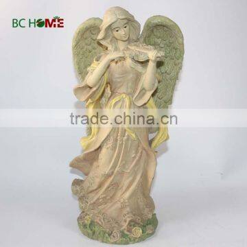 beautiful flying resin guardian angel figurine