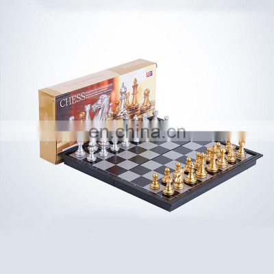 Hot selling high quality foldable portable magnetic board game luxury chess machine chess magnetic luxury chess set games