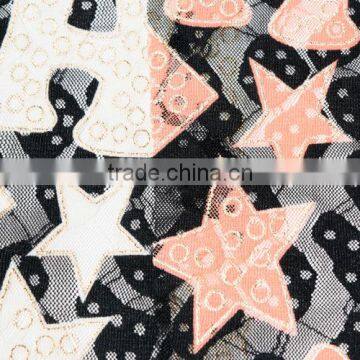 printed fishnet/ cut out fabric