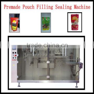 Premade pouch fill and seal machine