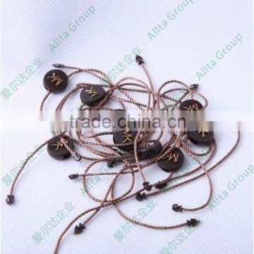 Custom Cheap Plastic Embossed Seal Tag With Polyester String