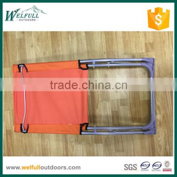 Stock orange color portable scissors outdoor chair