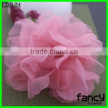 Artificial pink flower for hair decoration