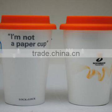 Ceramic cup with silicone sleeve