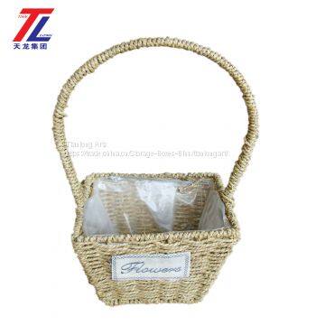 wholesale cheap grass braid stitched natural gift straw basket with handle