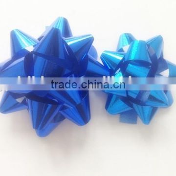 Glitter blue star bow in matte metallic/China factory supply PP pull star bow for festival decoration,shiny star bow,gift bow