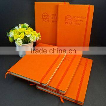 A5 orange thermo pu debossed logo diary with elastic band