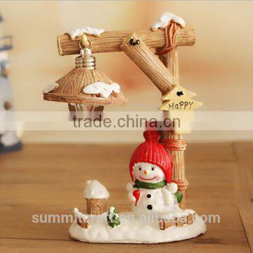 Resin houses decorated with christmas lights snowman lamp