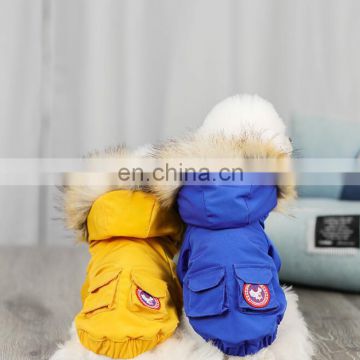 Hot style winter pet clothing snowsuit for a small dog with a thick hood and padded four-legged coat for dog