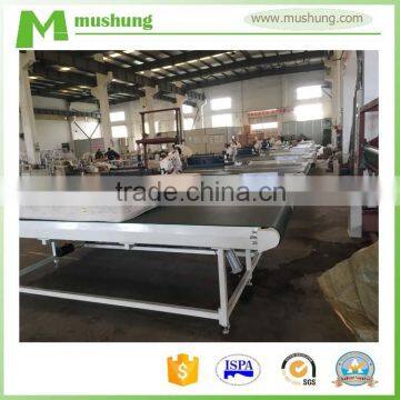 automatic flipping mattress tape edge machine