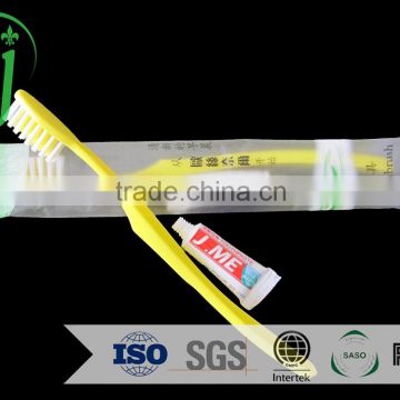 2015 new design comfortable plastic disposable hotel toothbrush /5g toothpaste