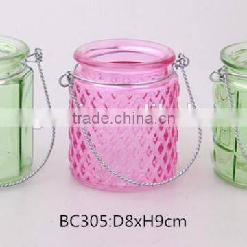glass jar sprayed color with metal lifting handle