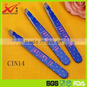 Colorful paint spraying stainless steel finger nail file in beauty salon
