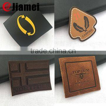 Hot selling custom embossed effect patch leather label