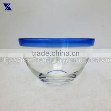 hand made glass bowl with blue rim