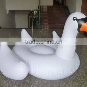 Factory OEM promotional white pvc inflatable swan rider,, animal water floating lounger