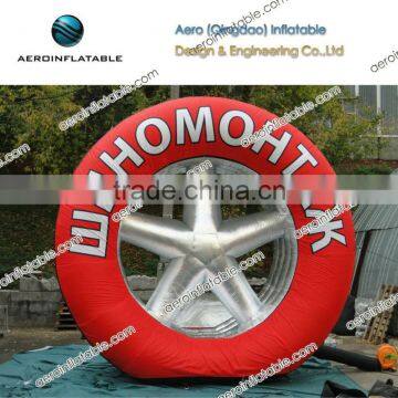 Large inflatable advertising red tyre