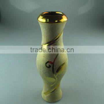 beautiul golden porcelain type vase with flower design