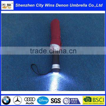 Wholesale red automatic led flying umbrella/3 folding torch handle umbrella/led light umbrella red color