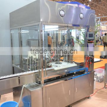 Double headed automatic liquid filling machine