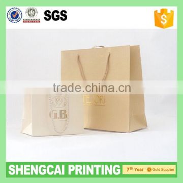 Cream color boutique paper bags with OEM logo