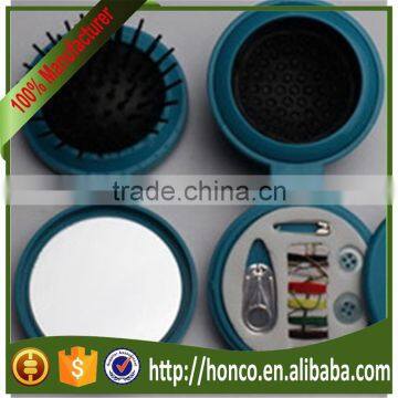 Sewing kit with mirror and comb