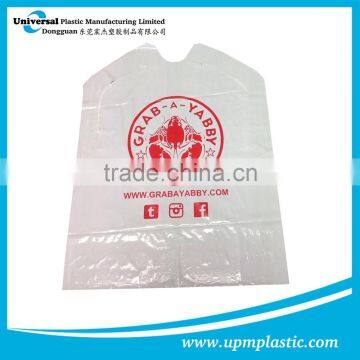 Disposable plastic adult bibs with crumb catcher and ties