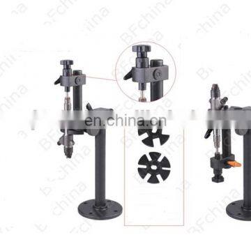 Convertible injector dismounting stand