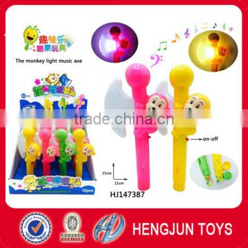 promotional candy gift toys monkey music and light candy toy plastic axe toy 12pcs