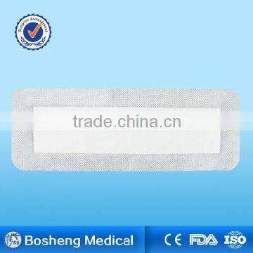 Self-adhesive wound dressing